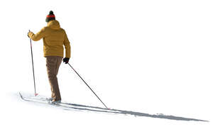 cut out backlit man skiing