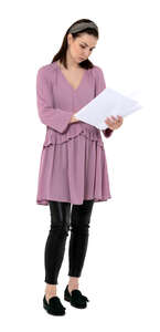 cut out woman standing and reading some papers