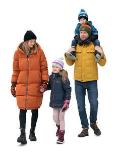 cut out family in winter walking together