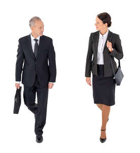 cut out top view of two businesspeople walking