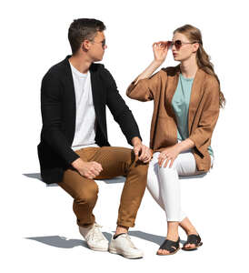 cut out man and woman sitting and talking