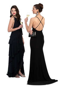 two cut out women in evening dresses standing and drinking champagne