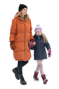 cut out mother and daughter in winter walking hand in hand