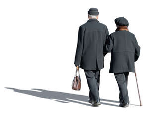 cut out elderly couple in overcoats walking arm in arm