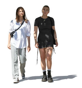 two cut out women walking under a tree shadow