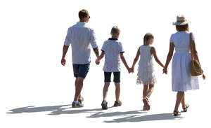 cut out backlit family in summer walking hand in hand