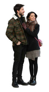 cut out couple in autumn standing and looking in one direction