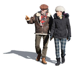 two cut out elderly people walking in wintertime
