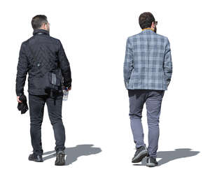 two cut out men walking on a sunny spring day