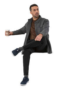 cut out man sitting and drinking coffee