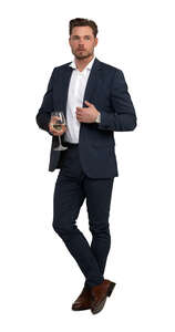 cut out man leaning on a bar counter and drinking wine