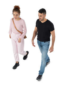 two cut out people walking seen from above