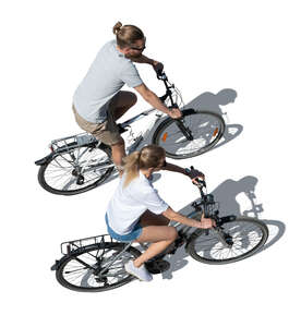 two cut out people cycling seen from above