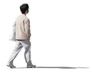 cut out asian man in white clothing with a face mask walking