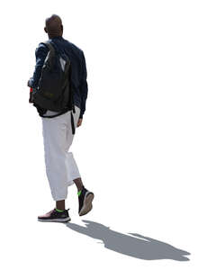 cut out backlit black man walking