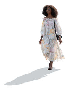 cut out backlit woman in a summer dress walking