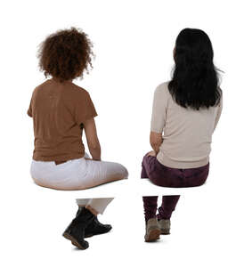 two cut out women sitting seen from back angle