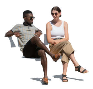 cut out man and woman sitting outside and talking