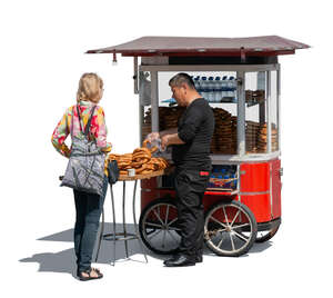 cut out woman buying bread in the street