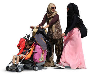 two muslim women walking with a baby carriage