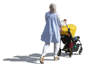 muslim woman with a baby stroller walking