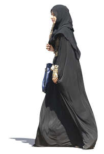 muslim woman in a black abaya walking