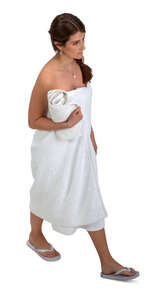cut out top view of a woman in a sauna towel walking 