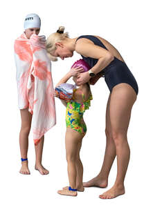 cut out woman with two kids at the pool preparing to go swimming