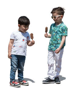 two cut out little boys standing and eating ice cream