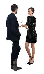 cut out man and woman standing at a bar and drinking champagne