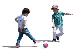 two cut out little boys playing football