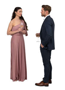 cut out man and woman at a fancy party standing and drinking wine