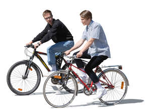 two cut out teenage boys cycling and talking