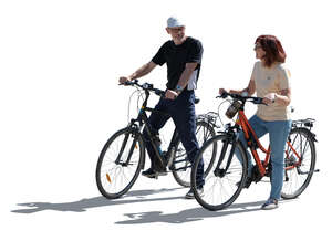 cut out backlit man and woman on bikes stopping and talking