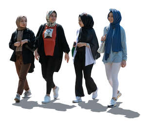 four cut out middle east teenagers walking