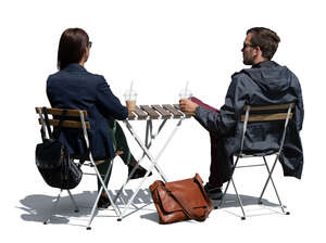 cut out man and woman sitting in a coffeeshop