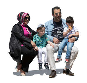 cut out muslim family with two kids sitting on a bench outside