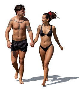 cut out couple walking happily on the beach