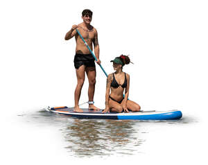 cut out man and woman paddleboarding