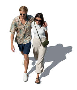 cut out couple walking and holding each other seen from above