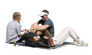 cut out group of three young people sitting and talking