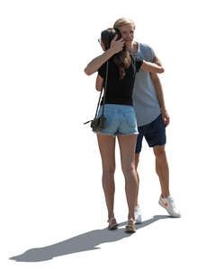 cut out backlit man and woman greeting and hugging