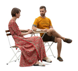 cut out man and woman sitting in a cafe and talking