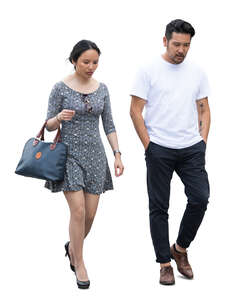 two cut out asian people walking together