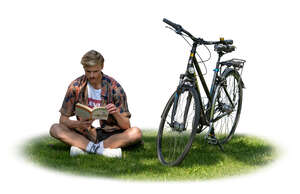 cut out man sitting on the grass in a tree shade and reading a book