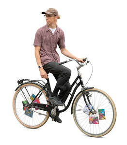 cut out man riding a bike and looking back over his shoulder