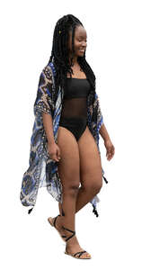 cut out black woman in a swimsuit walking