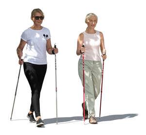 two cut out women nordic walking in partial shade