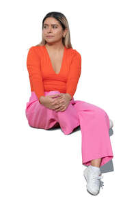 cut out woman in pink costume sitting