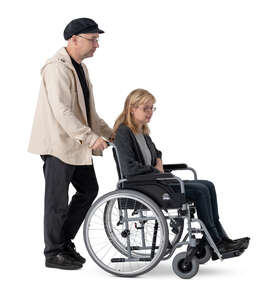 cut out man pushing a woman sitting in a wheel chair